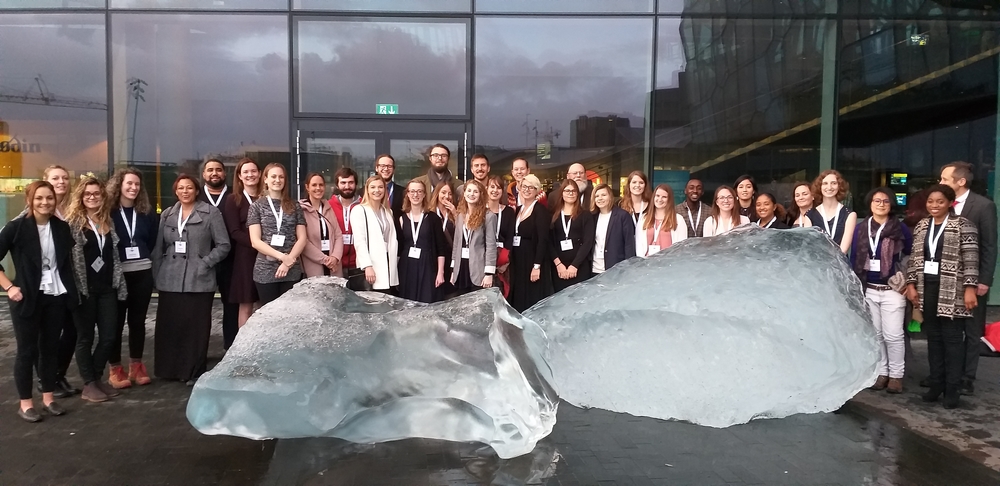 Students, staff and faculty at the Arctic Circle in front of Icebergs from Kommuneqarfik Sermersooq Municipality in Greenland.