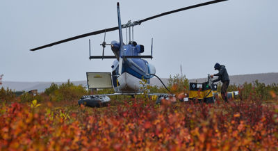 François Malenfant, Masters of Applied Science candidate from Saint Mary’s University, checks a timelapse camera monitoring an erosion site on Pelly Island, Northwest Territories, Canada PHOTO: Weronika Murray