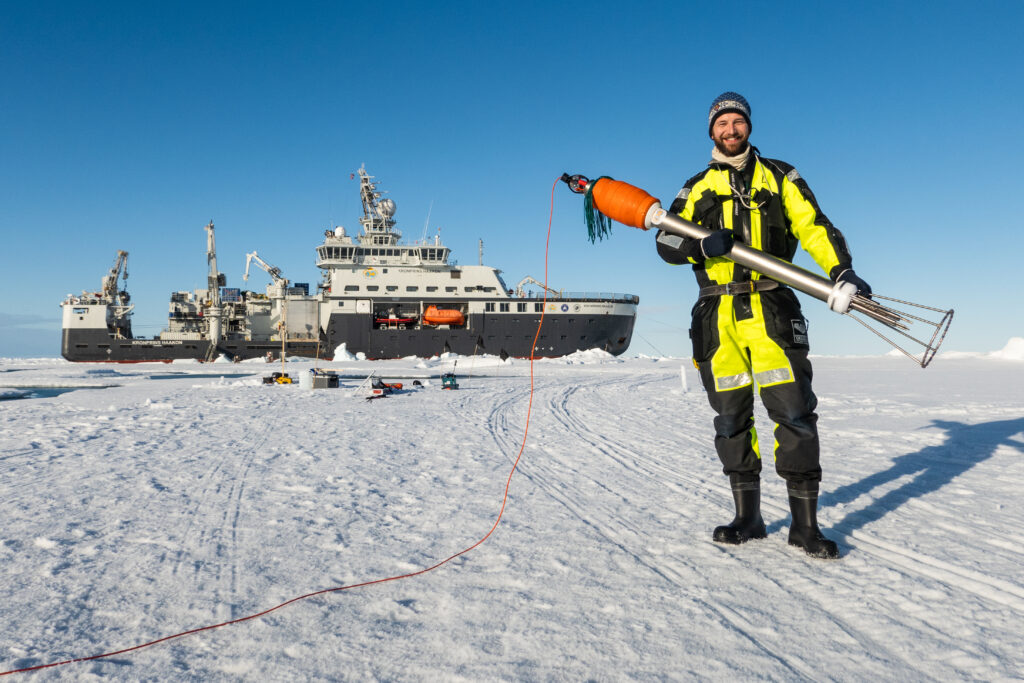Deployment of the Norwegian Polar Institute’s deepest (4200 m) and northernmost (86° 32’ N) mooring “Amundsen-1” from the research vessel Kronprins Haakon though a small lead in the sea ice on 7 August 2022.
